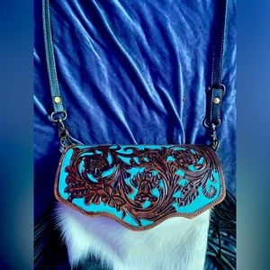 Cowhide and leather purse with leather wallet